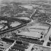 Glasgow, general view, showing Macfarlane, Lang and Co. Victoria Biscuit Works, Clydeford Drive and Tolcross Park.  Oblique aerial photograph taken facing east.