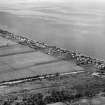 Saltburn, Invergordon, general view.  Oblique aerial photograph taken facing east.  This image has been produced from a damaged negative.