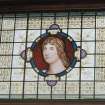 Interior, view of ground floor library figurative stained glass window depicting a bust of Virgil