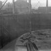 General view of fitting spiral guides for inner lift of Number 4 tank, Meadowflats Gasholder Station, Holyrood Road, Edinburgh.