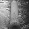 Bronze 6-pounder gun in Gulley A. The effects of abrasion on its surface are plain. Note also the rounded pebbles and smoothly round bedrock.