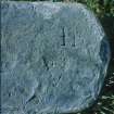 Markings on a Type 1 lead ingot, a crowned V and the letters I B. It is thought that the latter is the mark of John/Joseph Bright, active in the Peak District during the earlier part of the 18th century.