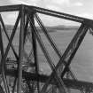 Forth Rail Bridge and Dalgety Bay, Firth of Forth.  Oblique aerial photograph taken facing north-east.  This image has been produced from a print.