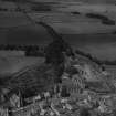Falkland Palace and Parish Church.  Oblique aerial photograph taken facing north.  This image has been produced from a print.