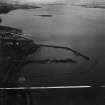 Granton Harbour, Edinburgh.  Oblique aerial photograph taken facing west.  This image has been produced from a crop marked print. 
