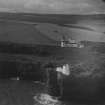 Todhead Lighthouse and Fog Station, Todhead Point.  Oblique aerial photograph taken facing west.  This image has been produced from a print.