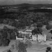 Duns Castle and Estate.  Oblique aerial photograph taken facing north.  This image has been produced from a print.