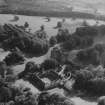 Duns Castle and Estate.  Oblique aerial photograph taken facing south-east.  This image has been produced from a print.
