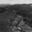 River Meig and Strathconon Wood, Strathconon Forest.  Oblique aerial photograph taken facing east.  This image has been produced from a print.