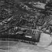 Edinburgh, general view, showing William Younger and Co. Ltd. Holyrood Brewery and Calton Hill.  Oblique aerial photograph taken facing north-west.  This image has been produced from a crop marked print.