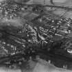 Melrose, general view, showing High Street and Melrose Abbey.  Oblique aerial photograph taken facing north-west.  This image has been produced from a print.