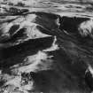 Hindhope Hill Hillfort and Hunthall Hill, Cheviot Hills.  Oblique aerial photograph taken facing east.  This image has been produced from a damaged print.
