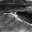 Hindhope Hill Hillfort and Loddan Hill, Cheviot Hills.  Oblique aerial photograph taken facing north-west.  This image has been produced from a print.