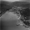 Lochranza, general view, showing Lochranza Castle and Torr Nead an Eoin, Isle of Arran.  Oblique aerial photograph taken facing south-east.  This image has been produced from a print.