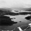 Morar Bay and Loch Morar.  Oblique aerial photograph taken facing east.  This image has been produced from a damaged print.