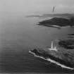 Ardnamurchan Lighthouse and Sanna Bay.  Oblique aerial photograph taken facing north-east.  This image has been produced from a damaged print.