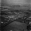 Coupar Angus, general view, showing George Street and Bogside Road.  Oblique aerial photograph taken facing north.  This image has been produced from a damaged print.