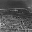 Methil, general view, showing Methil Docks and Bowling Green Street.  Oblique aerial photograph taken facing south-east.  This image has been produced from a print.