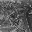 Leven, general view, showing Wemyss Sawmills, Riverside Road and Bawbee Bridge.  Oblique aerial photograph taken facing south-east.  This image has been produced from a print.