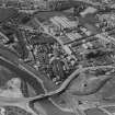 Wemyss Sawmills, Riverside Road and Bawbee Bridge, Leven.  Oblique aerial photograph taken facing north.  This image has been produced from a print.