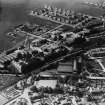 Kirkcaldy, general view, showing Barry, Ostlere and Shepherd Caledonia Linoleum Works, Station Road and Kirkcaldy Museum and Art Gallery.  Oblique aerial photograph taken facing north-west.  This image has been produced from a print.