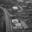 Caledonian Stove and Iron Works and Smith and Wellstood Ltd. Columbian Foundry, Seabegs Road, Bonnybridge.  Oblique aerial photograph taken facing east.  This image has been produced from a print.