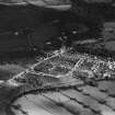 Gatehouse of Fleet, facing north, showing Girthon Parish Church, Church Street and High Street.  Oblique aerial photograph taken facing south-east.  This image has been produced from a print.
