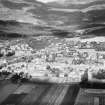 Kingussie, general view.  Oblique aerial photograph taken facing north.  This image has been produced from a print.