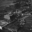 Perth, general view, showing Dewar's Distillery Glover Street Works and Graybank Road.  Oblique aerial photograph taken facing south-west.  This image has been produced from a print.