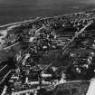 Lossiemouth, general view, showing Stotfield Road and St Gerardine's Road.  Oblique aerial photograph taken facing north-east.  This image has been produced from a print. 