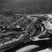 Lossiemouth, general view, showing Lossiemouth Harbour and High Street.  Oblique aerial photograph taken facing north.  This image has been produced from a damaged print. 