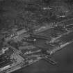 Dundee, general view, showing King William IV Dock and Caird Hall, City Square.  Oblique aerial photograph taken facing north.  This image has been produced from a print.