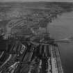 Dundee, general view, showing Dundee Docks and Tay Bridge Station.  Oblique aerial photograph taken facing north-east.  This image has been produced from a print.