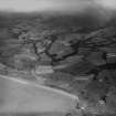 Glenapp Estate, general view, showing Ballantrae and Laggan.  Oblique aerial photograph taken facing east.  This image has been produced from a damaged print.