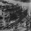John Brown's Shipyard, Clydebank, Queen Elizabeth under construction.  Oblique aerial photograph taken facing south.  This image has been produced from a damaged print.