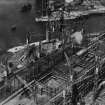 John Brown's Shipyard, Clydebank, Queen Elizabeth under construction.  Oblique aerial photograph taken facing north-west.  This image has been produced from a damaged print.