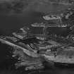 Ardrossan Harbour and Refinery.  Oblique aerial photograph taken facing north.  This image has been produced from a print.