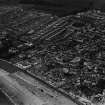 Largs, general view, showing St Columba's Parish Church, Gallowgate Street and Kelvin Street.  Oblique aerial photograph taken facing north-east.  This image has been produced from a print.