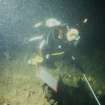 Maritime photographs: Underwater photograph of a diver planning the wreck site