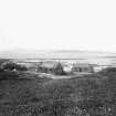 View of unidentified blackhouses on Eriskay, South Uist.