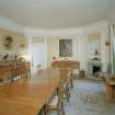 Interior. View of dining room from S showing canted corner fireplace