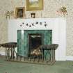 Interior. Detail of first floor master bedroom fireplace with painted swallows