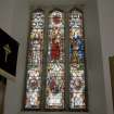 Interior. S wall of nave. Stained glass window. Detail