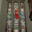 Interior. S wall of nave. Stained glass window. Detail
