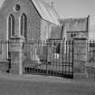 Gate piers, wrought-iron gates, detail