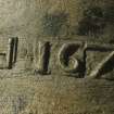 Detail of lettering on watch bell (HXD 174), showing individual digit dies.