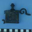 Copper-alloy container with removable screw-threaded knob and various attachments, before conservation (HXD 178). Function uncertain.