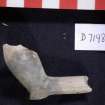 Broken clay pipe bowl, some iron staining, D7198 (HXD 016). Scale in centimetres.