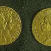 Gold guineas of William and Mary (left) and James II (right), obverse.	 Diameter 25mm.