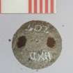 Pewter button, underneath view (HXD 207).